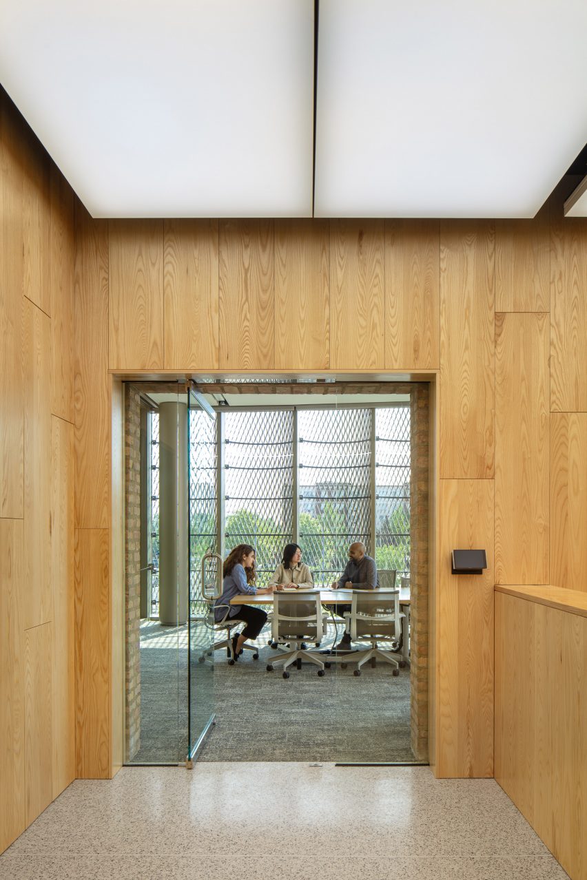 Wood-panelled walls in a meeting room
