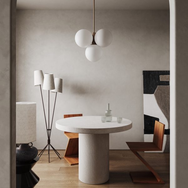 Photograph of dining room interior with statement lighting