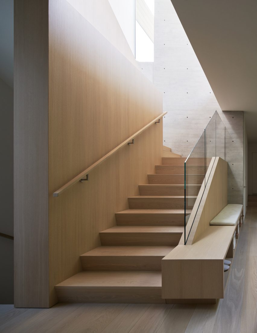 Timber staircase with a glass balustrade