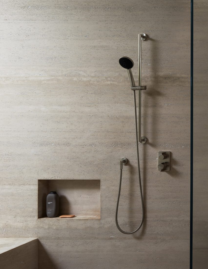 Stone-lined walk-in shower