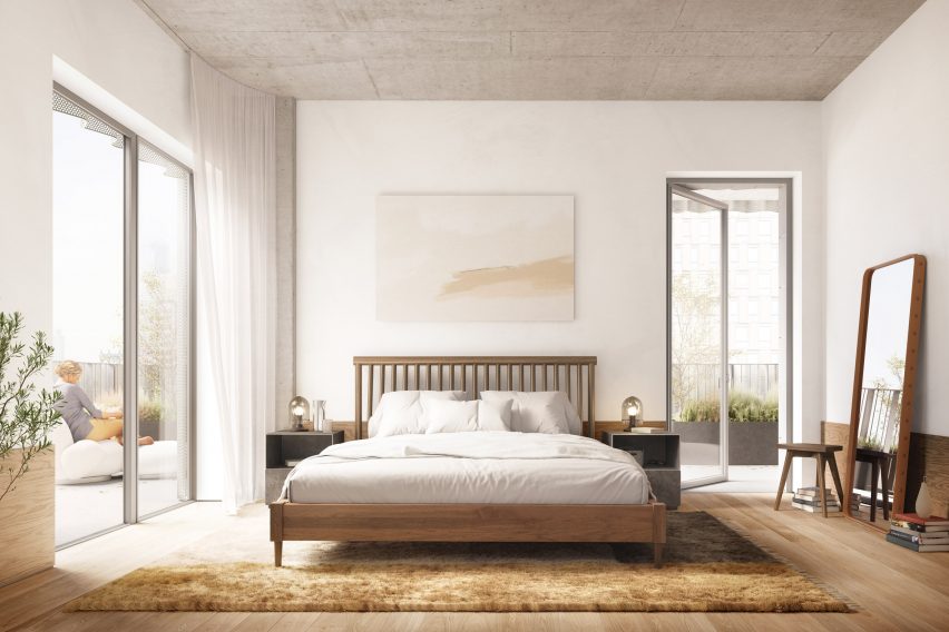 A large bedroom with entrances to an outdoor terrace on either side