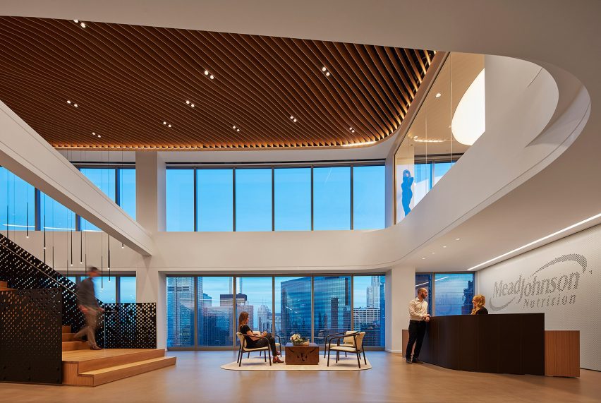 Soft Sound material on the ceiling of a double-height space by NOWN