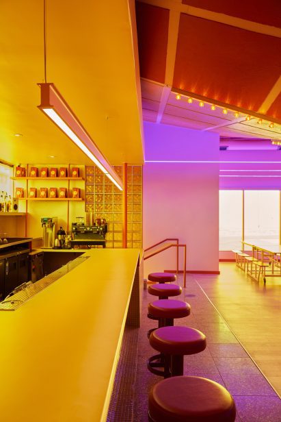 Bar counter with red stools