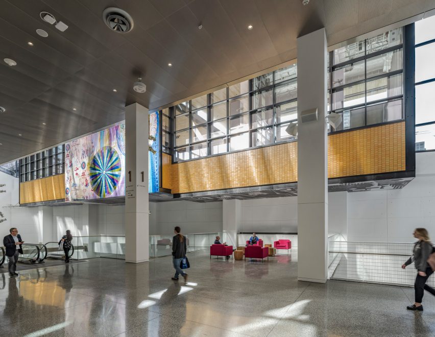 A lobby with large columns and an atrium