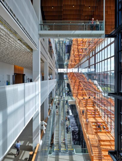 A building with a large wooden staircase against the facade