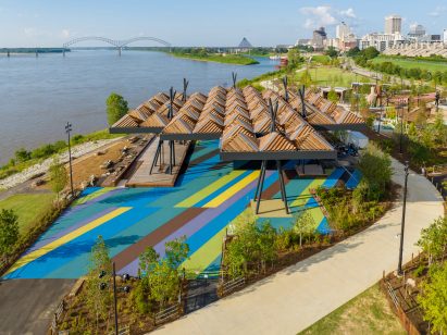 Park on Mississippi with wooden canopy and city in background