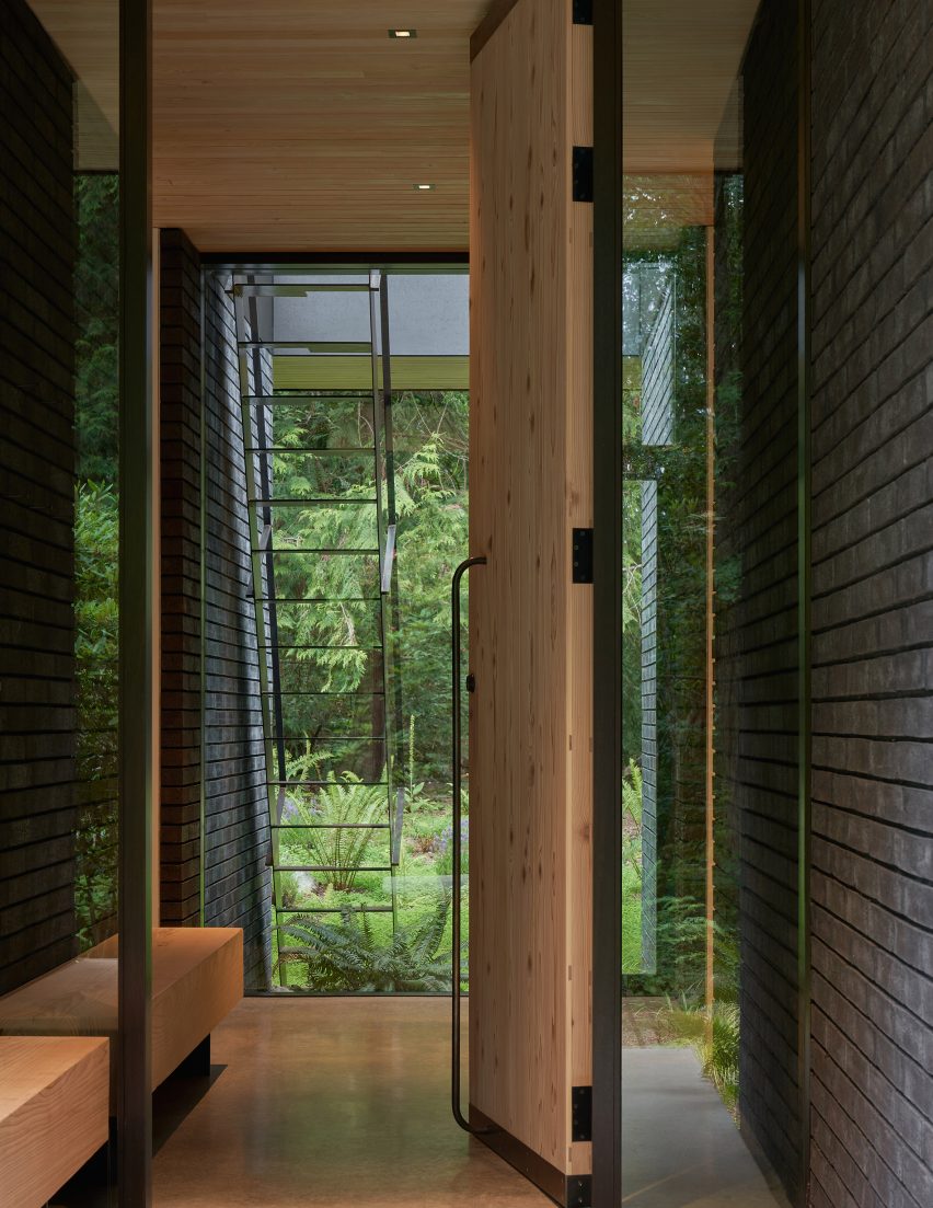 Wooden door leading to a the interior of The Rambler house by GO'C