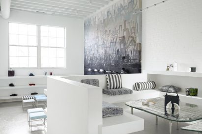 Built-in seating area in front of shoe display room