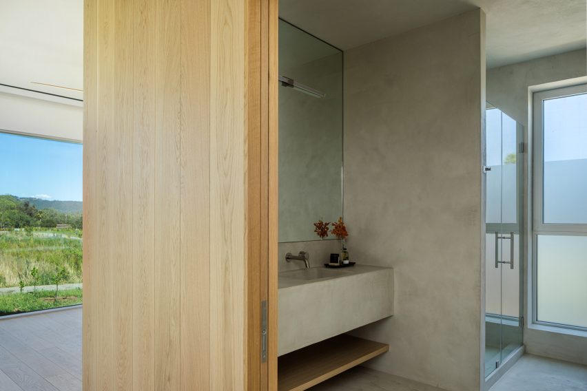 Bathroom with concrete walls and sink