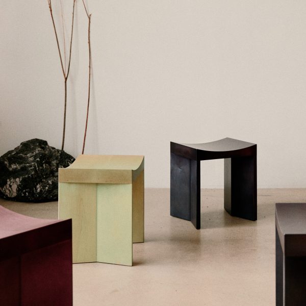 Curved stools in beige room