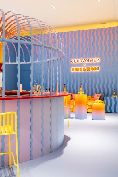 Bar and seating area in Courvoisier pop-up bar at Selfridges designed by Yinka Ilori