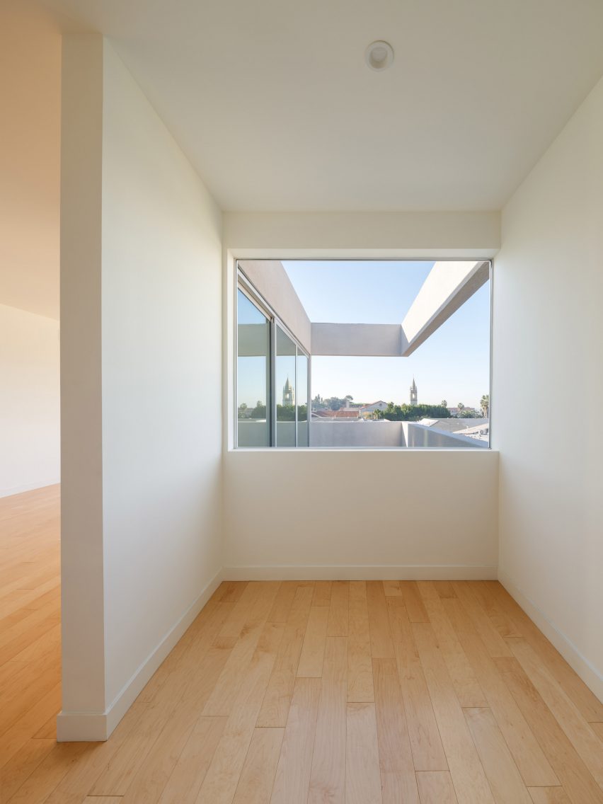 Interior space with white walls and timber floors