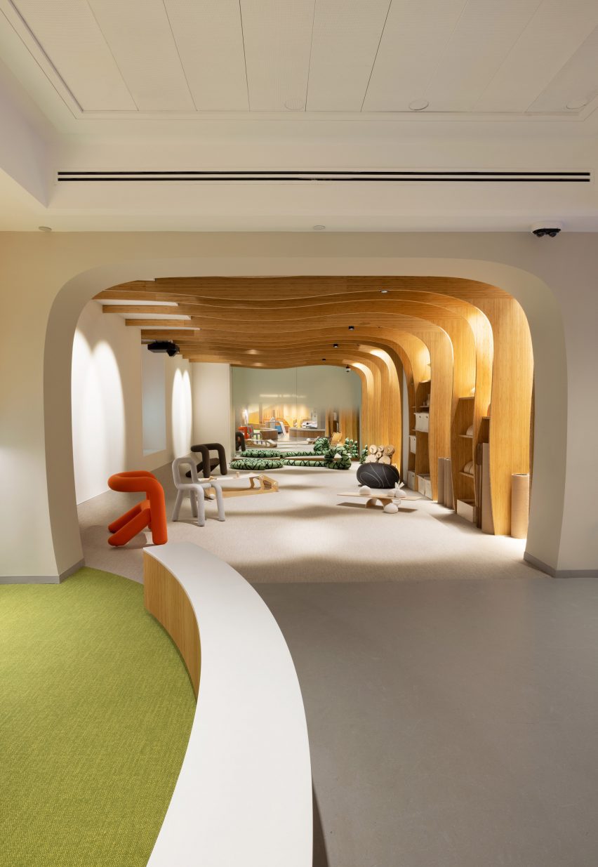 A hallway with a series of wooden archways