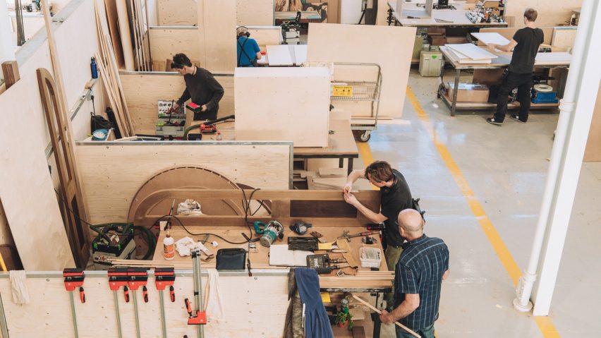 Photo of people working in a factory