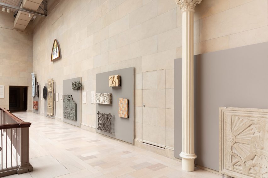 A large staircase gallery outfitted with pieces of buildings
