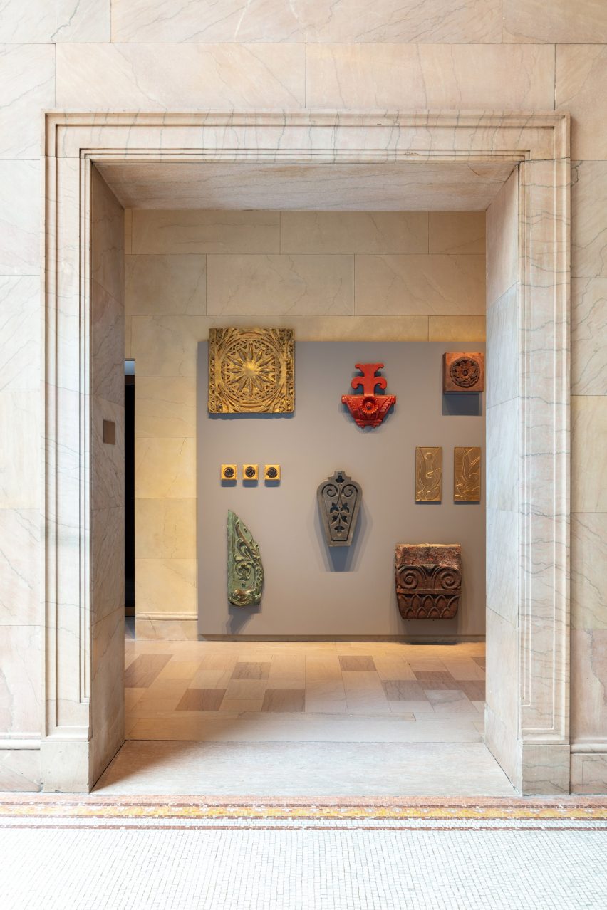 Cornices and other pieces of buildings attached to wall