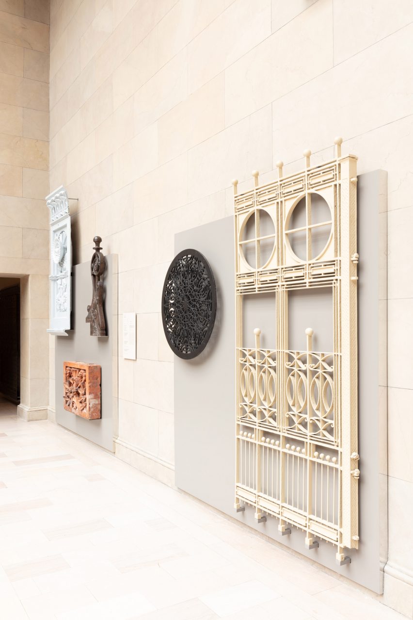 Stone cornice and iron gate