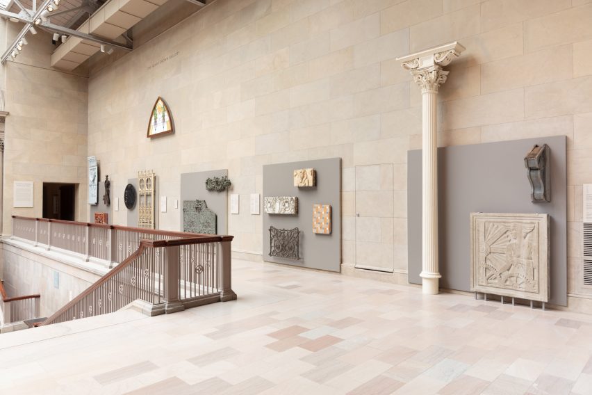 A gallery installed with pieces of buildings