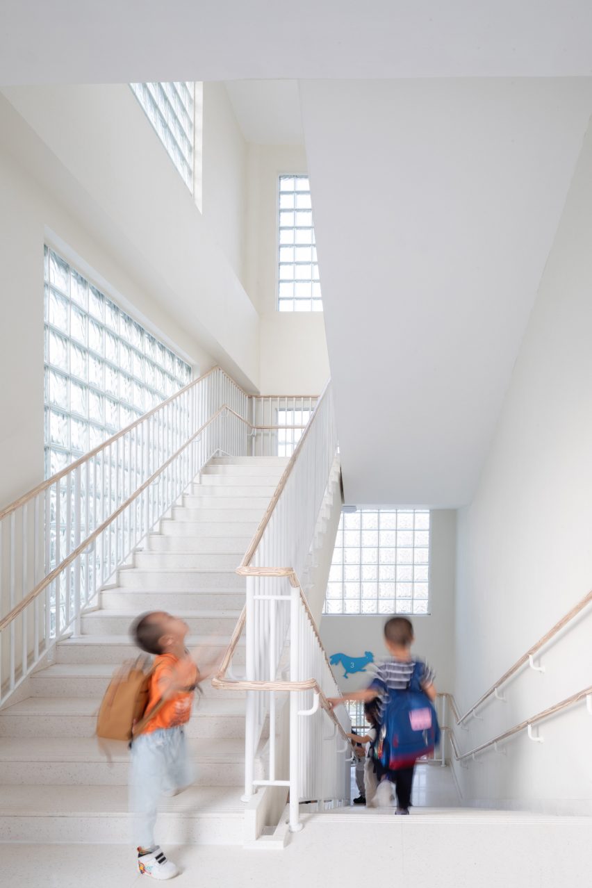 White staircase at the Kindergarten of Museum Forest by Atelier Apeiron