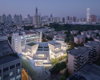 Staggered white balconies at Kindergarten of Museum Forest by Atelier Apeiron