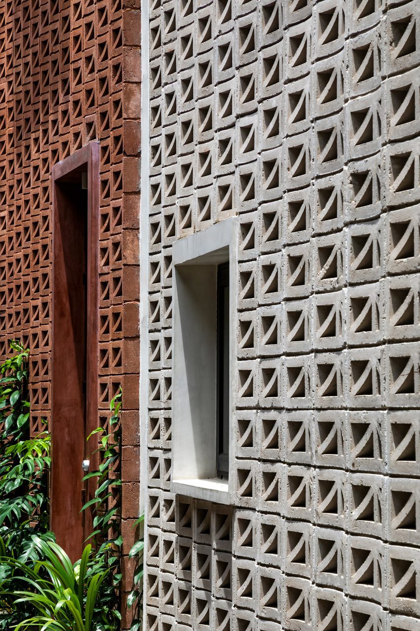 Red and grey perforated cement block facade