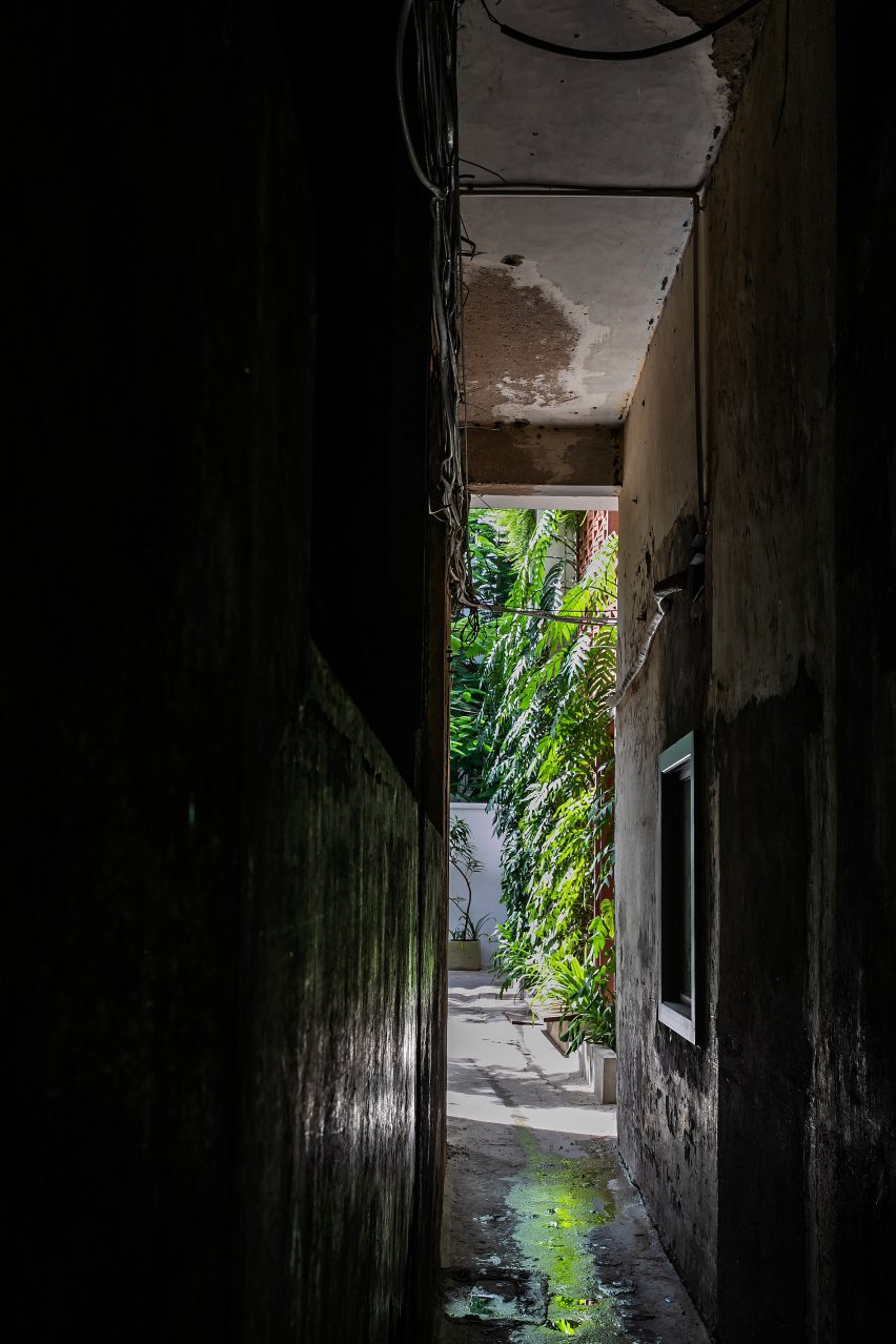 Narrow alleyway between buildings in Cambodia