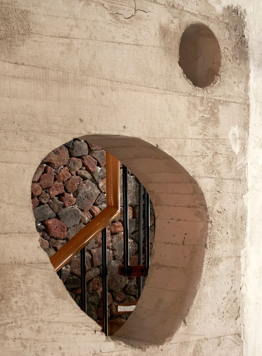 An oddly shaped cut out in a concrete wall