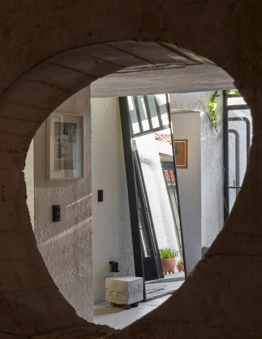An oddly shaped cut out in a concrete wall