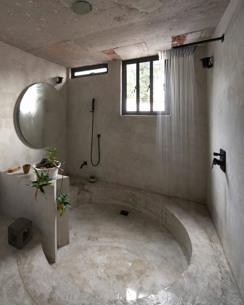 A bathroom with a circular cut out in the floor