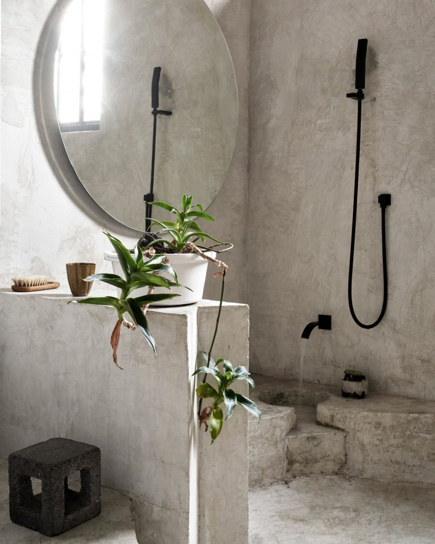 A bathroom with a circular cut out in the floor