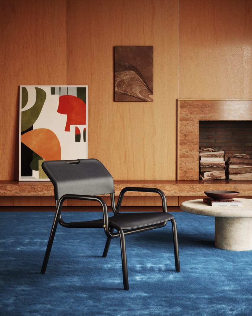 Chopper chair has the style of early 70s chairs and features a black chrome frame with black leather finishes