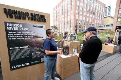 A person at a wooden booth along the highline