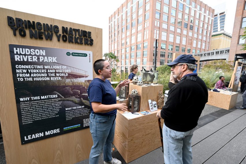 A person at a wooden booth along the highline