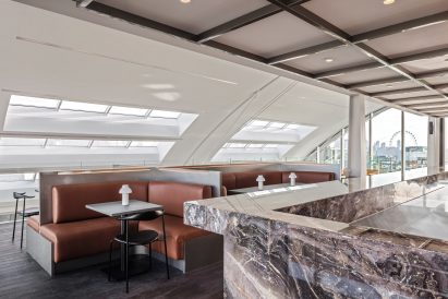 Seating banquettes inside London office by Universal Design Studio