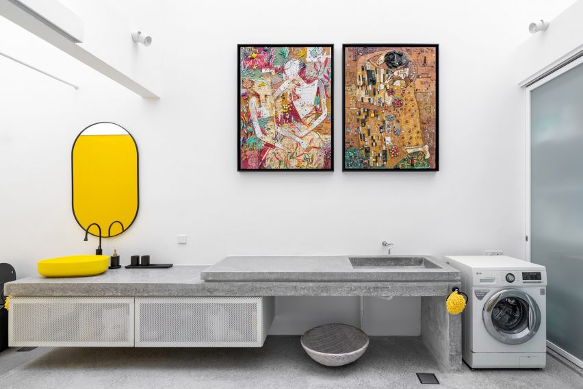 Utility room with a concrete worktop and yellow sink