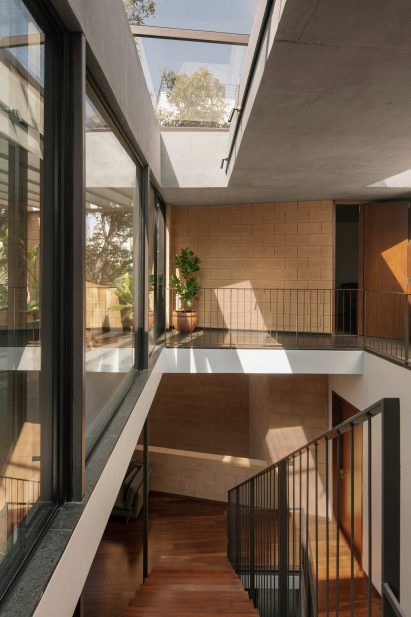 Atrium at the heart of Debris Block House by CollectiveProject