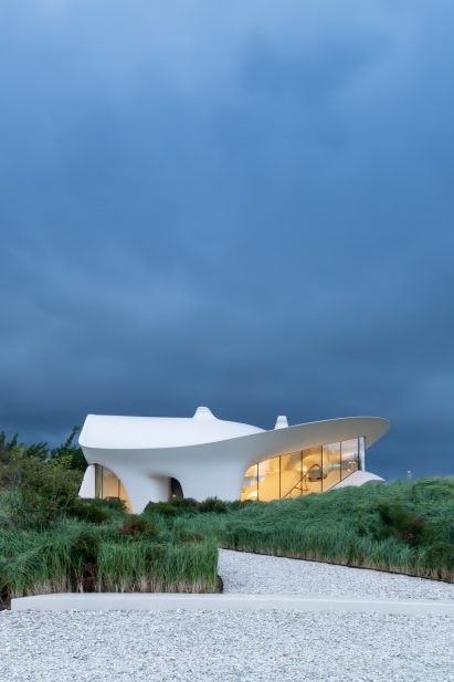 Blue Dream home with lights illuminated