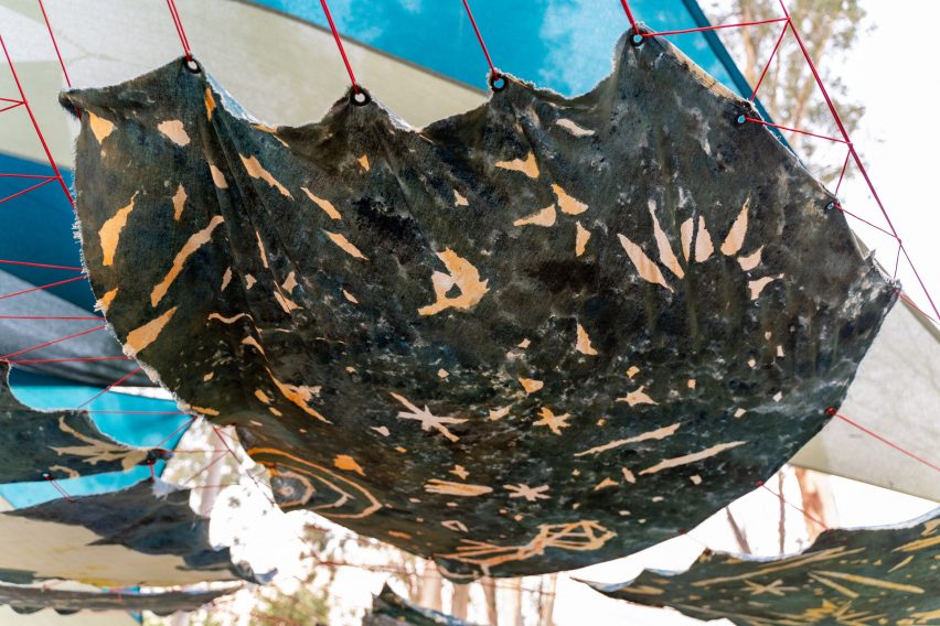 A piece of dyed fabric printed with shapes