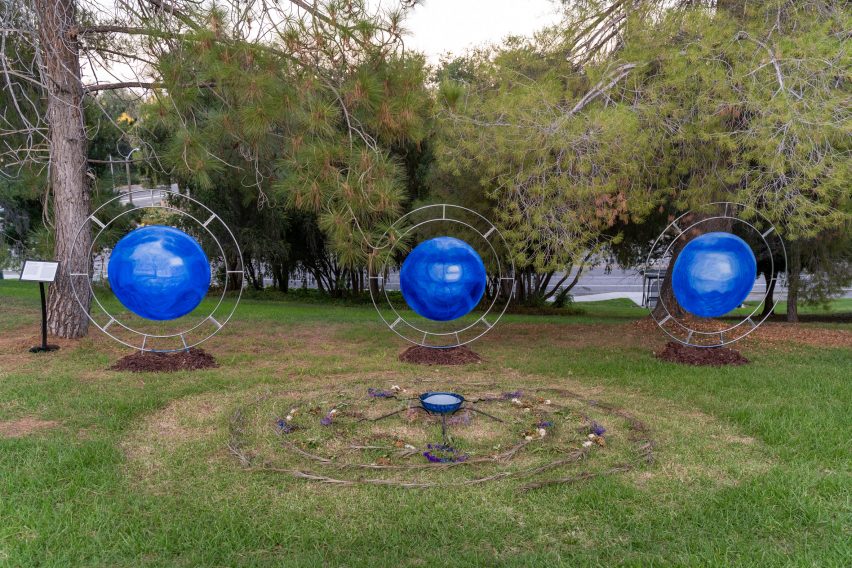 Bright blue circles surrounded by metal