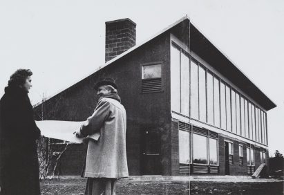 Women architects in front of built house