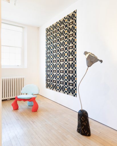 Lupita Lounge Chair by Mariangel Talamas Leal alongside Periscope Rug by A Rum Fellow and BUTW Floor Lamp by Charlotte Kingsnorth