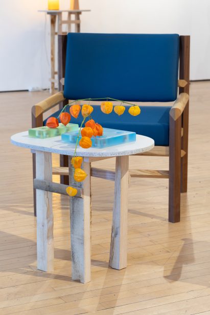 A Martino Gamper chair alongside a table by