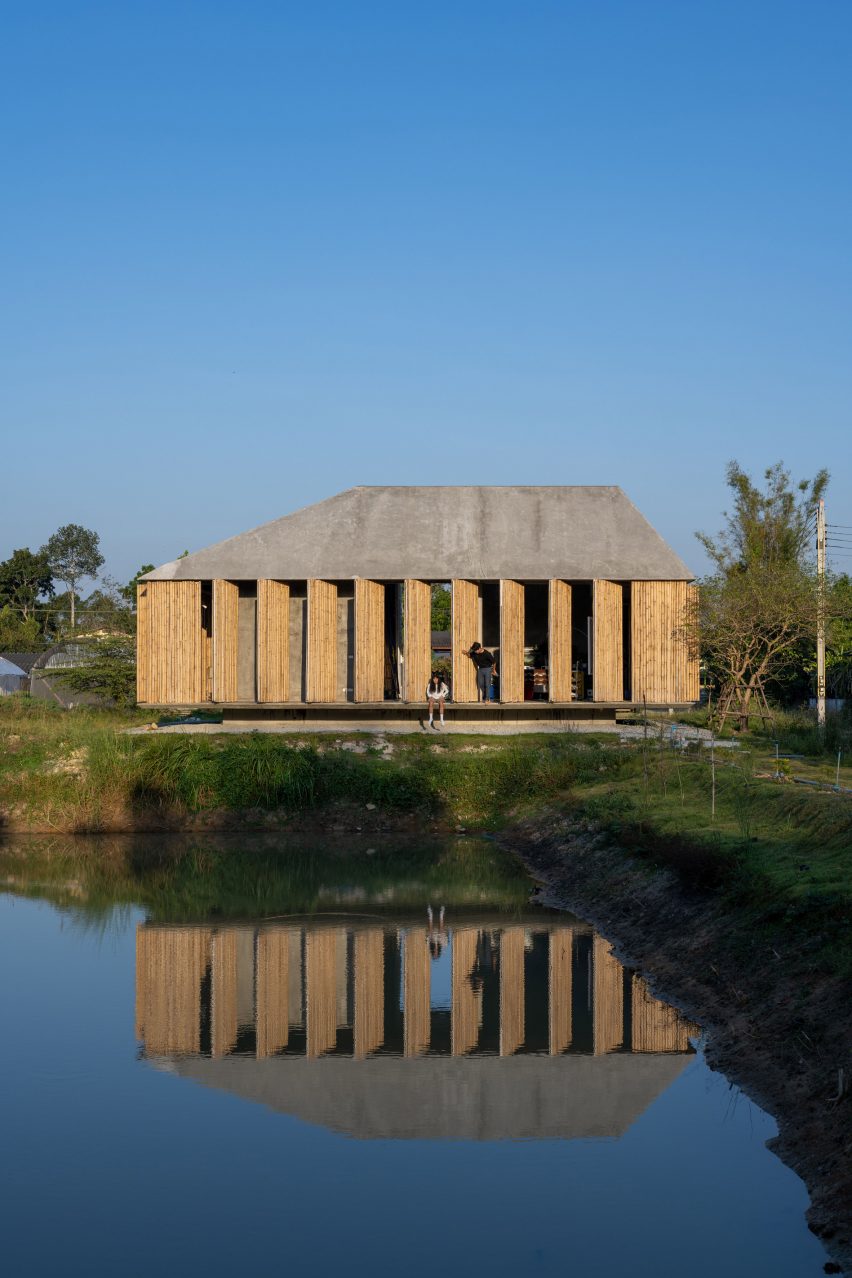 Bamboo artist's studio by a lake by 11.29 Studio