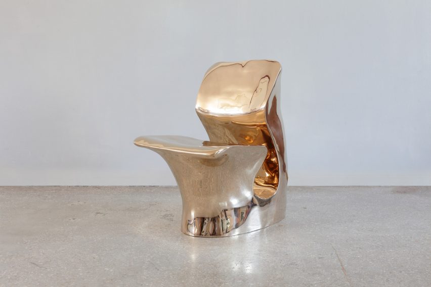 Reflective gold chair at the Growth and Form exhibition at Gallery Fumi