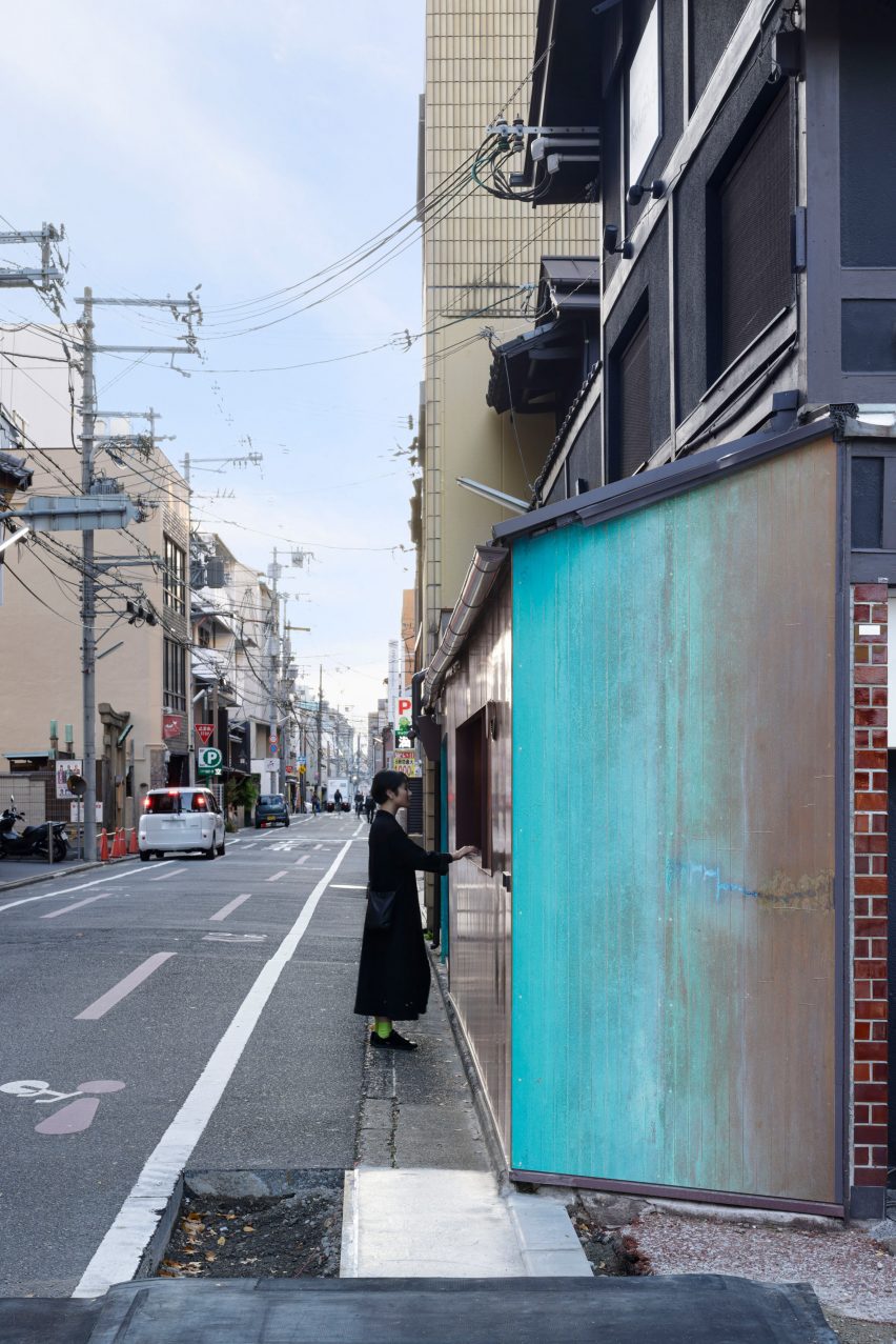 Blue oxidised copper kiosk by G Architects Studio