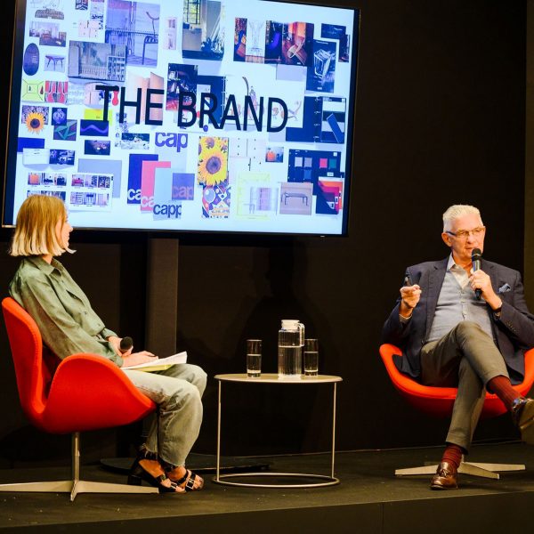 Photo of two people in conversation