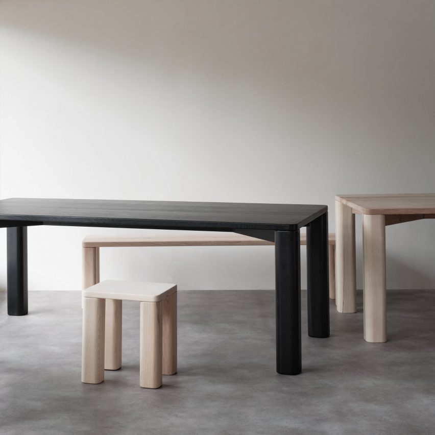 Natural and black wooden dining table, benches and stools by Goldfinger and the Tate Modern