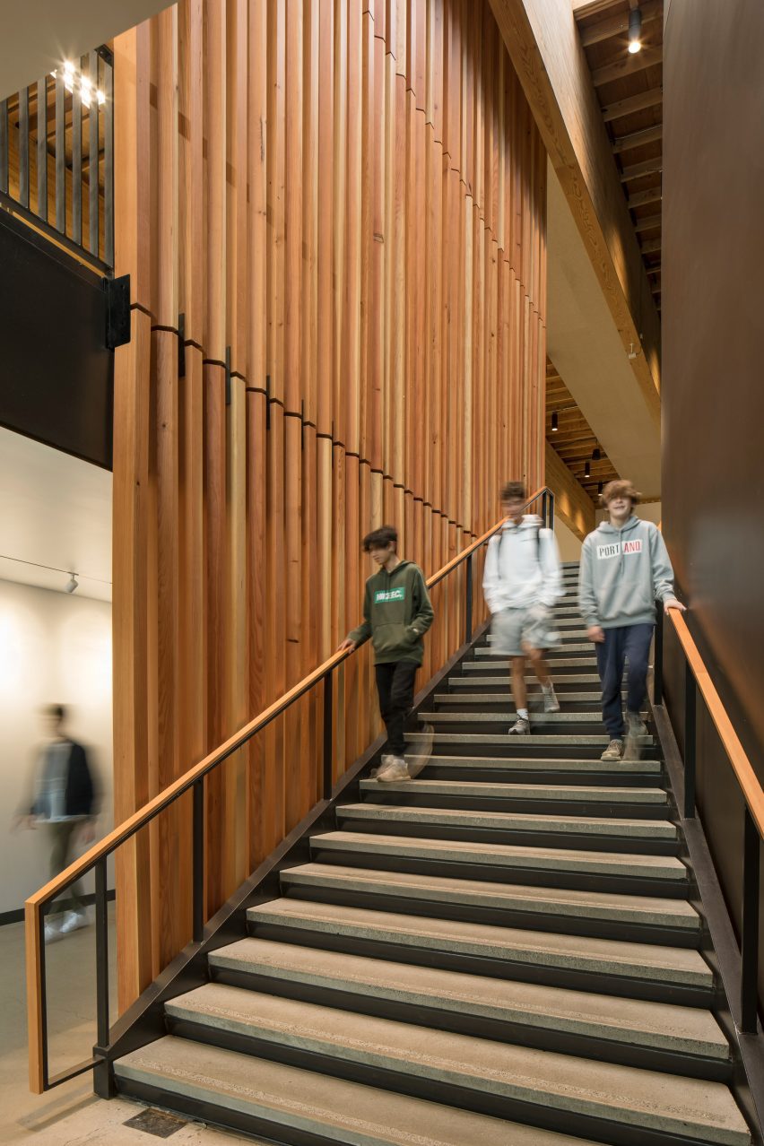 Staircase with wood-panelled siding