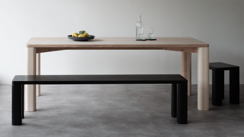 Natural and black wooden dining table, benches and stools by Goldfinger and the Tate Modern