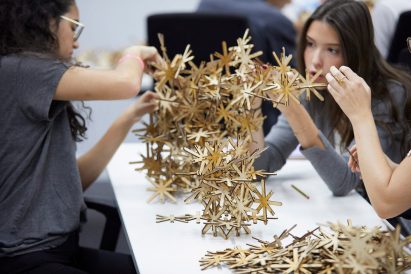 Students building architectural models
